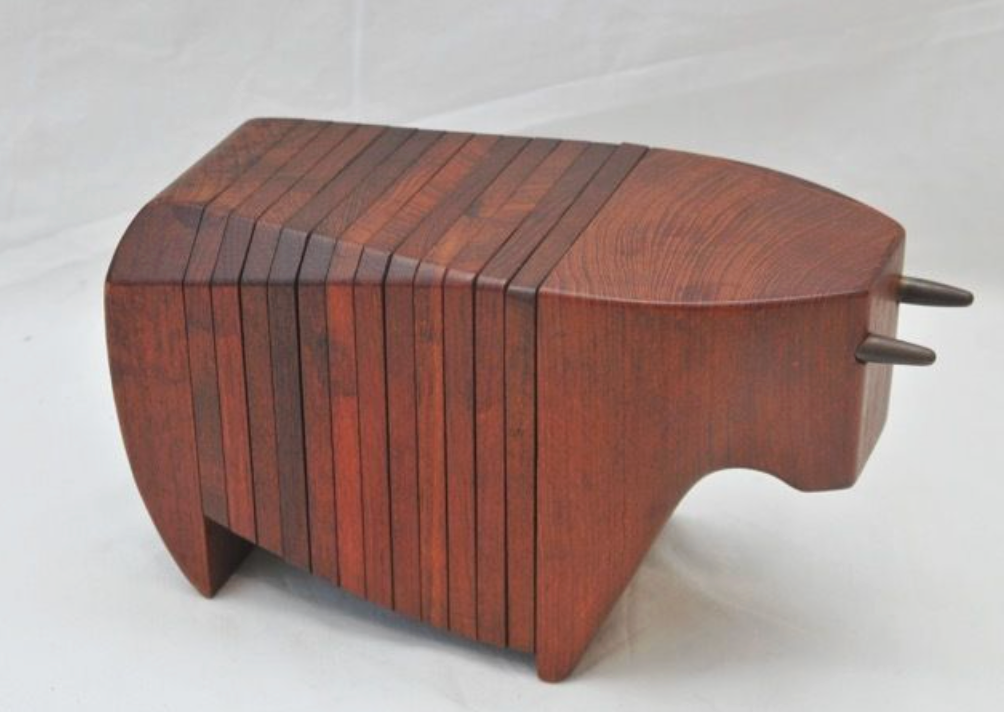 Product shot: Ernest Henriksen Teak Wood and Brass Bull Coaster Set